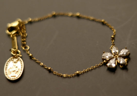 Bracelet orné d'un motif fleur 5 zircons et pendentif médaille Vierge amovible