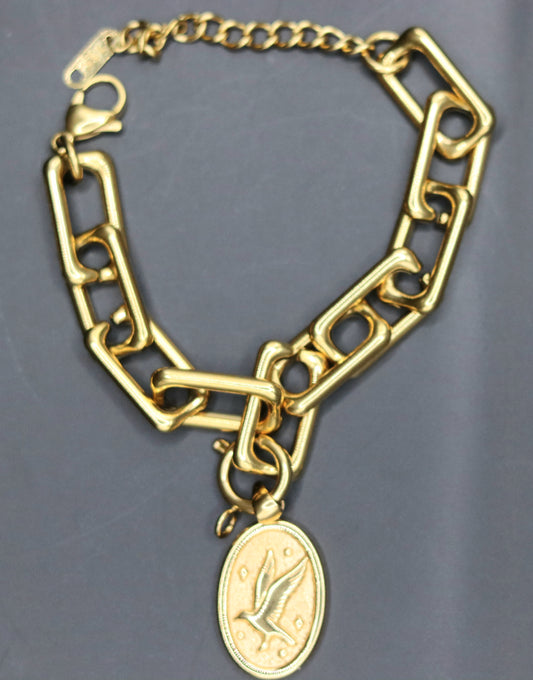Bracelet doré mailles rectangulaires orné d'un pendentif amovible médaille Colombe Esprit-Saint