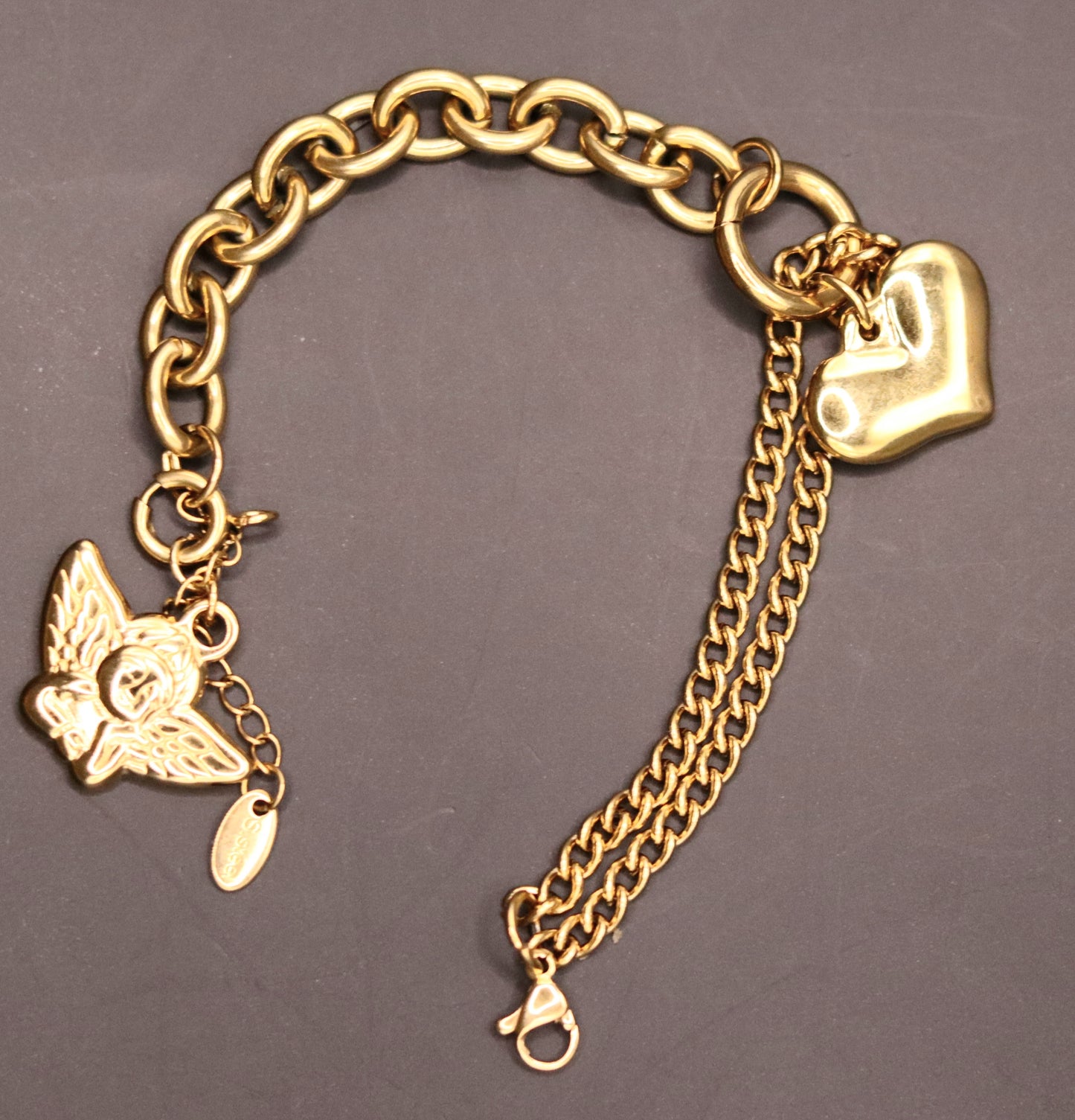 Bracelet doré 2 mailles différentes avec pampilles coeur et Ange Gardien amovible