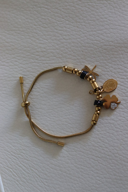 Bracelet lien coulissant motifs zircons noirs, pampilles trèfle, libellule et médaille amovible Vierge Miraculeuse